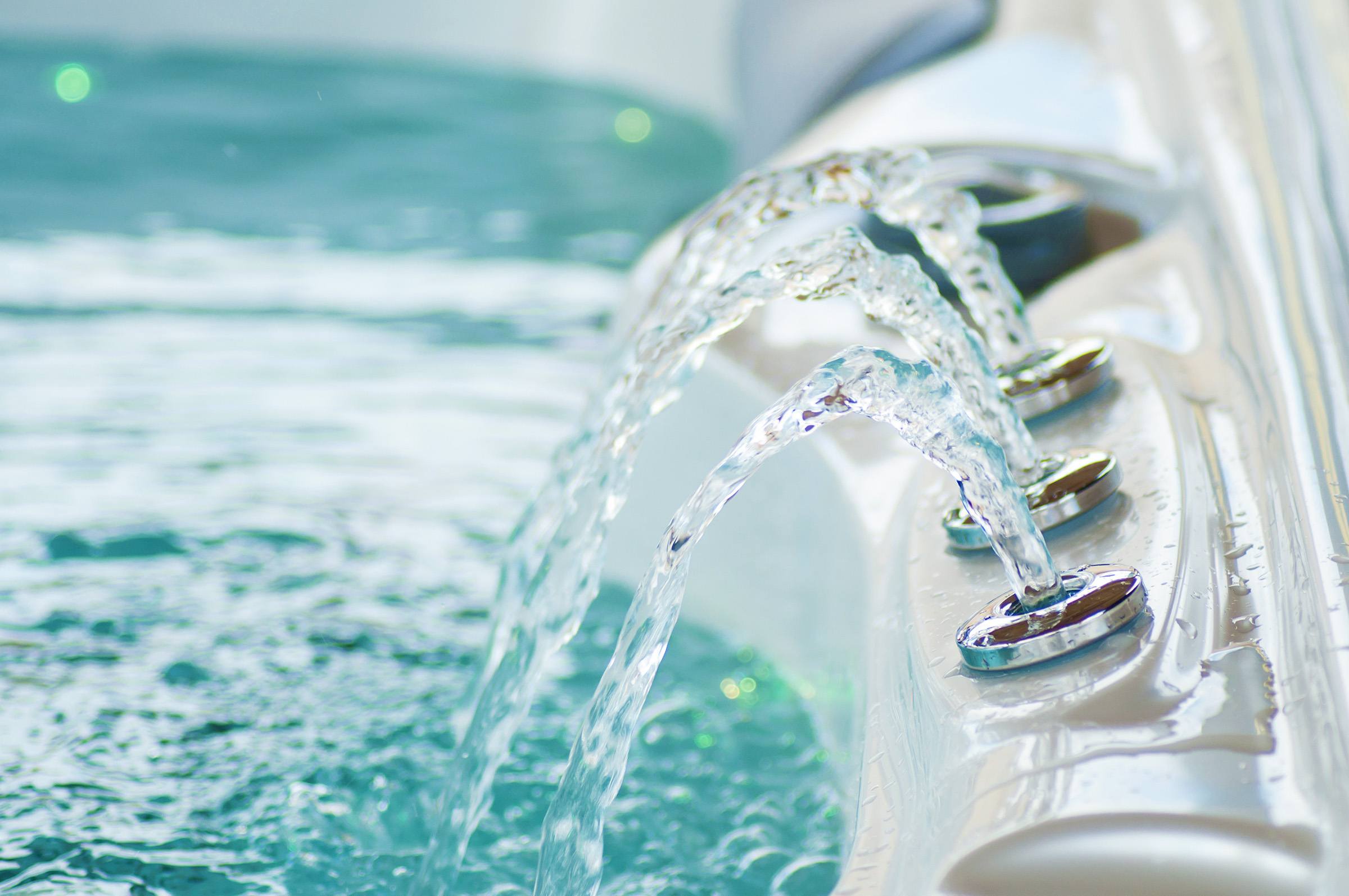 closeup of jet of water in swirl bath
